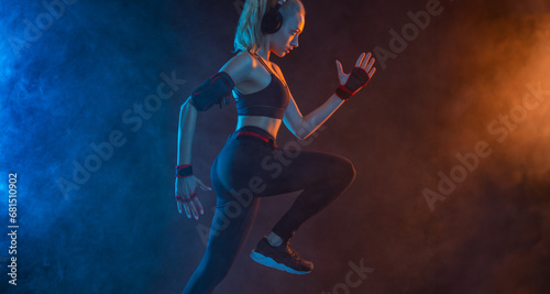 Runner running. Athlete sprinter run. Fit woman Influencer in neon colors. Download photo for advertising a fitness club in social networks. Cover for sport motivation music or video.