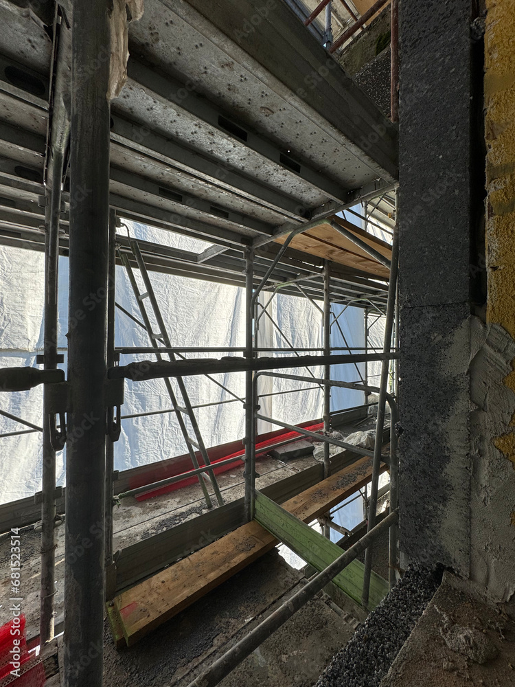 Fototapeta premium Thermal and acoustic insulation materials like polystyrene foam, mineral wool and polyurethane foam, applied outside a residential building.