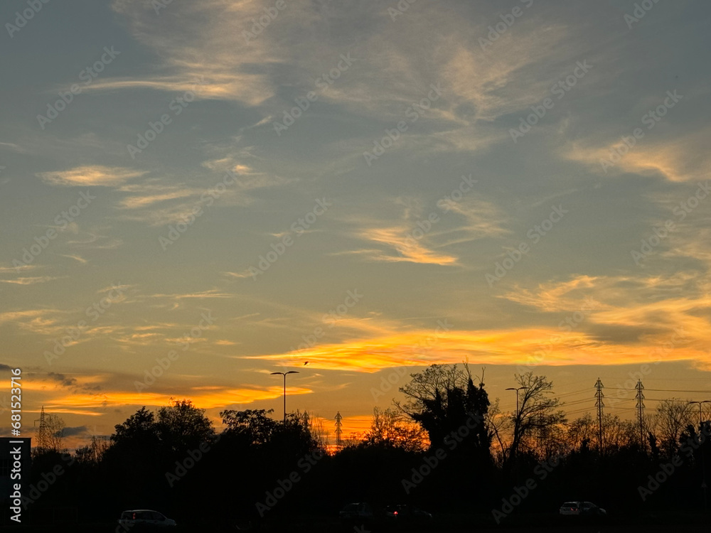 Sunset at the horizon in an urban area.