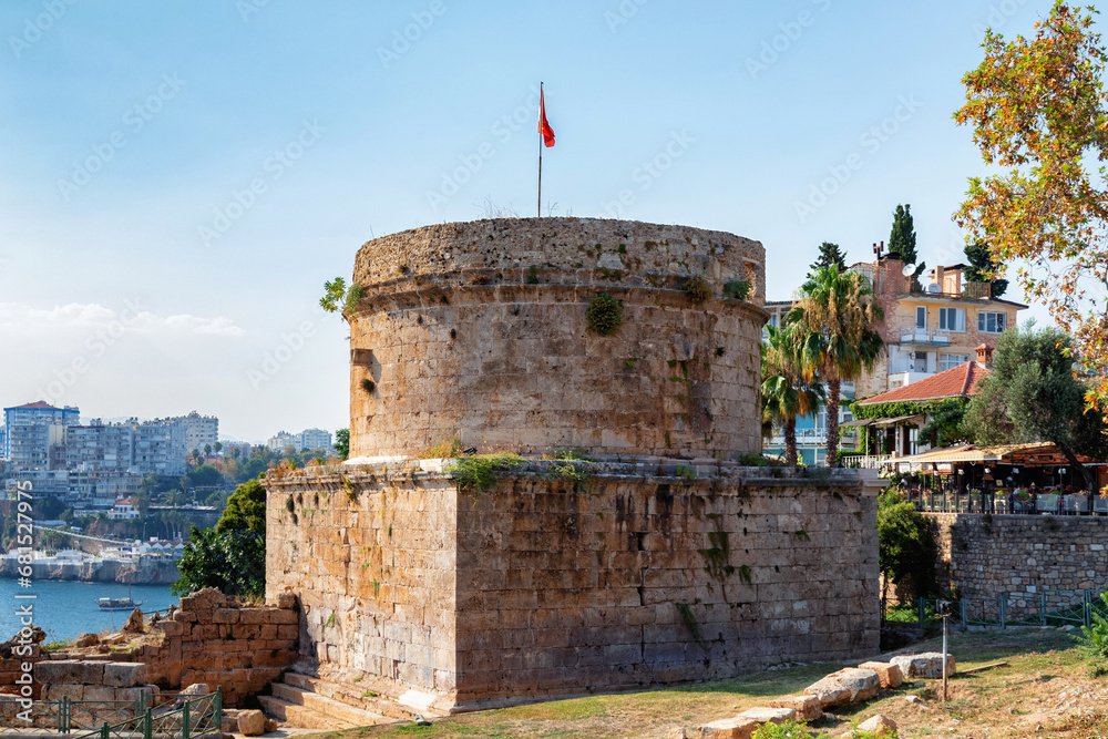 Fototapeta premium View of the Hıdırlık Tower in Antalya, Turkey. It is believed that the ruling Roman Empire built it in the second century CE. It has since been used as a fortification or a lighthouse.