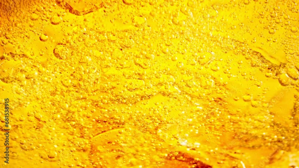 Super Slow Motion Detail Shot of Bubbling Lemonade Abstract Background at 1000fps.