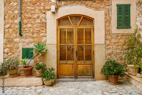 Beautiful typical entrance to the house with flowers in Fornalutx