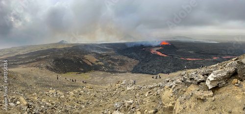 Tourists Watching Volcanic Eruption in Iceland 2023.