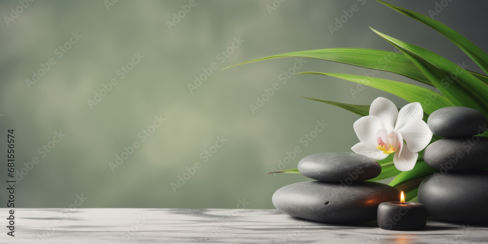 Obraz Zen stones, candles and white orchid flower on green and grey background with copy space, wellness and harmony, massage, spa and bodycare concept