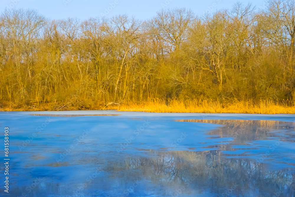 frozen winter river under a blue cloudy sky frozen winter river under a blue cloudy sky