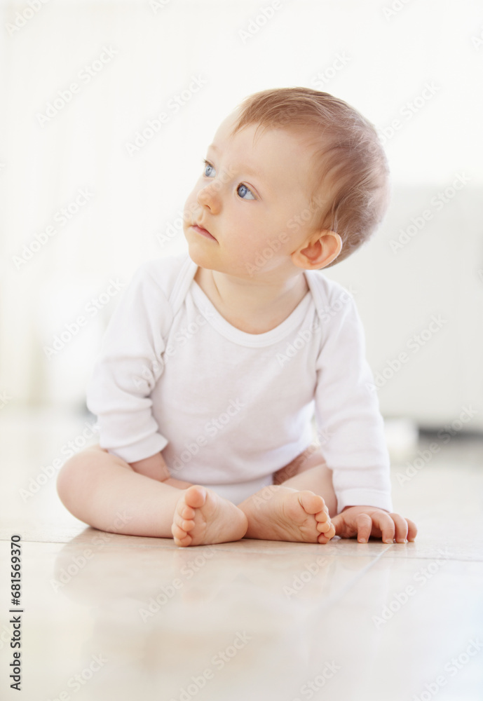Home, playing and baby on floor in living room to relax, resting and calm in nursery learning to crawl in morning. Family, youth and infant newborn for child development, growth and wellness in house Home, playing and baby on floor in living room to relax, resting and calm in nursery learning to crawl in morning. Family, youth and infant newborn for child development, growth and wellness in house