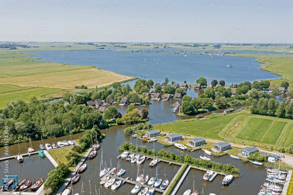 Aerial from houses with boats in Friesland the Netherlands