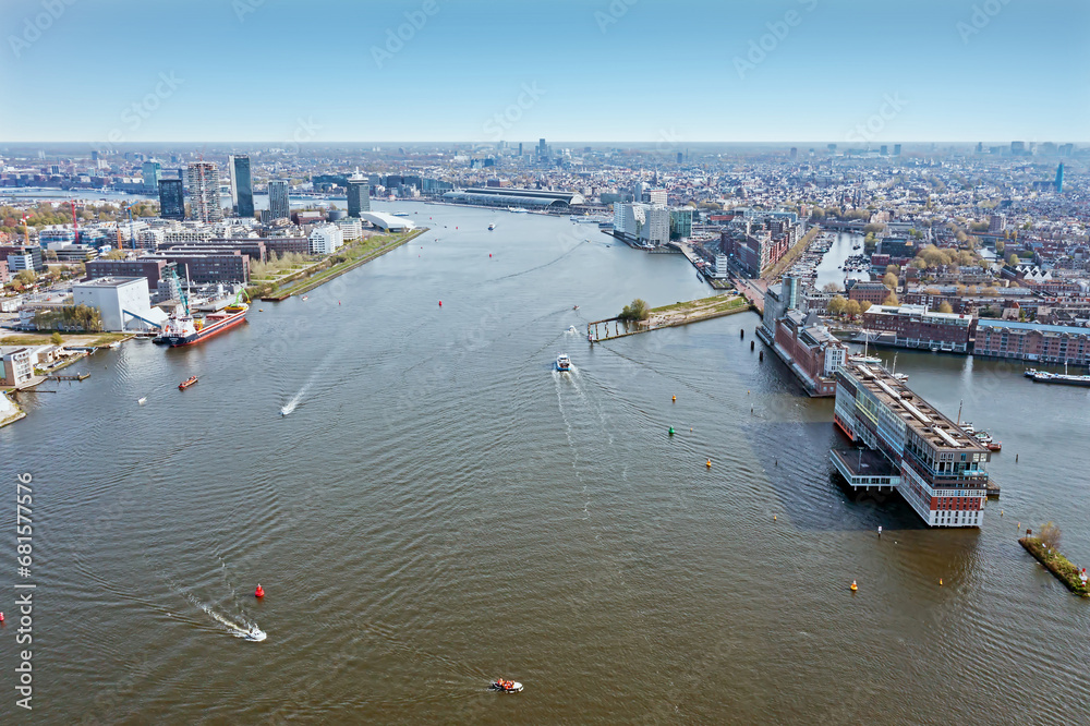 Aerial from the city Amsterdam at the IJ with the Central Station in the Netherlands