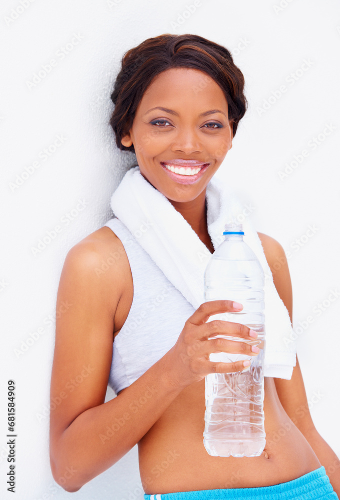 Black woman, exercise and water with portrait and smile from sport, workout and training in studio. Happy, healthy and African female athlete with wellness and drink after gym with white background Black woman, exercise and water with portrait and smile from sport, workout and training in studio. Happy, healthy and African female athlete with wellness and drink after gym with white background