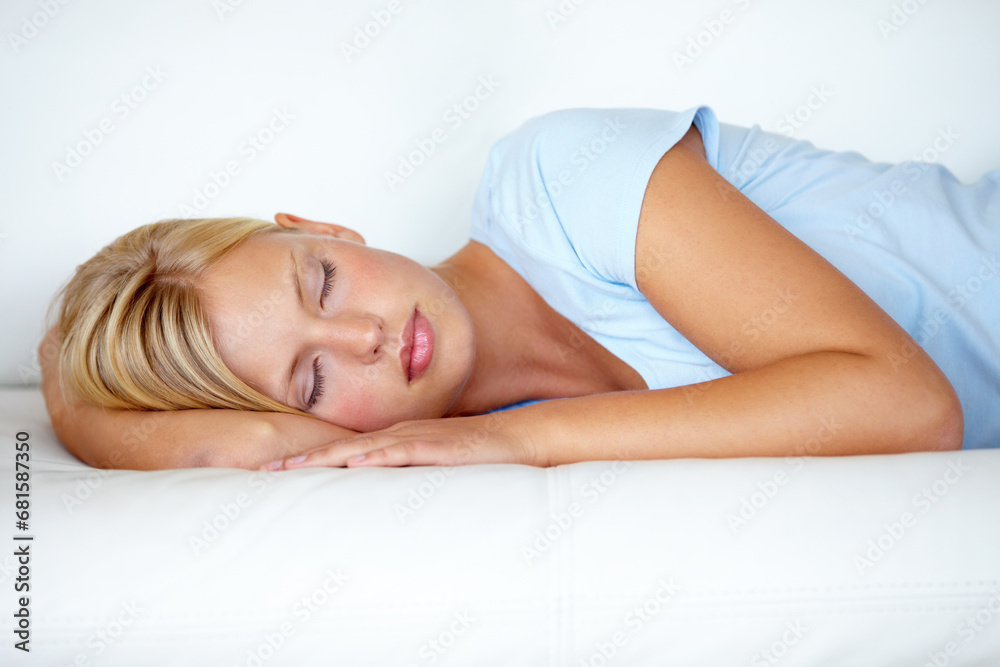 Home, relax and woman on a couch, sleeping and resting with weekend break, peaceful and calm. Person on a sofa, apartment and girl with fatigue, feeling tired and afternoon nap in a living room Home, relax and woman on a couch, sleeping and resting with weekend break, peaceful and calm. Person on a sofa, apartment and girl with fatigue, feeling tired and afternoon nap in a living room