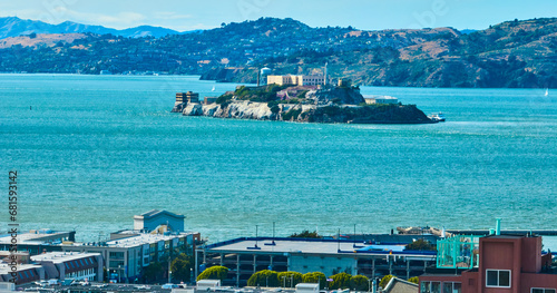 Alcatraz Island aerial from shore with San Francisco Bay, CA