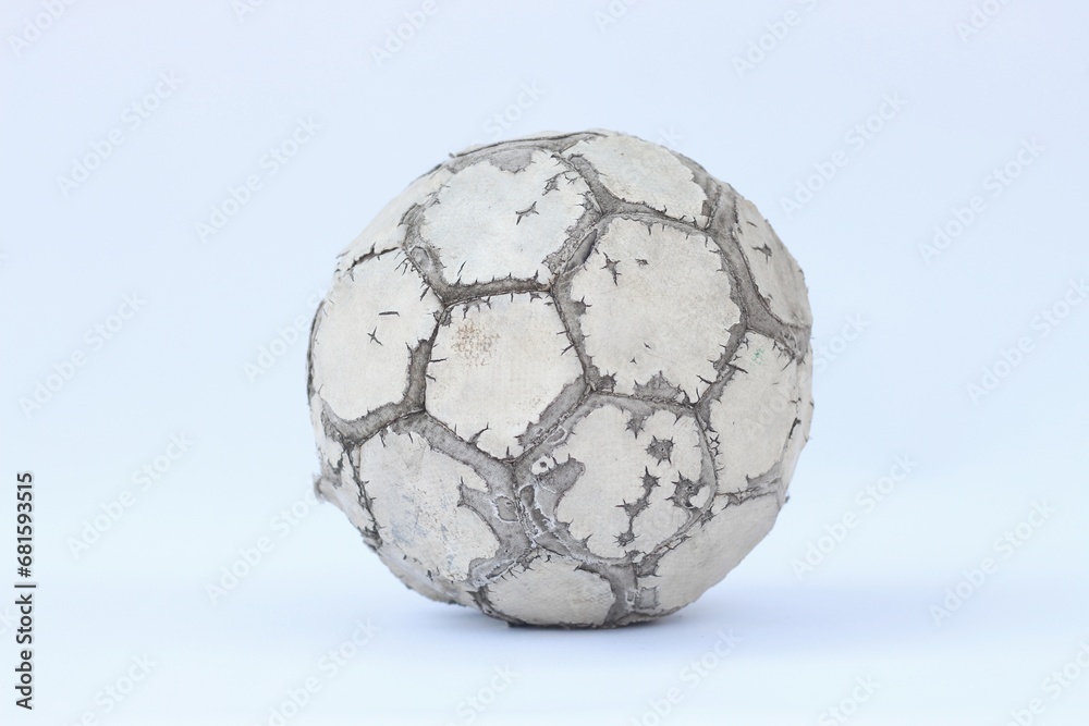 Old used football or soccer ball isolated on white background Old used football or soccer ball isolated on white background