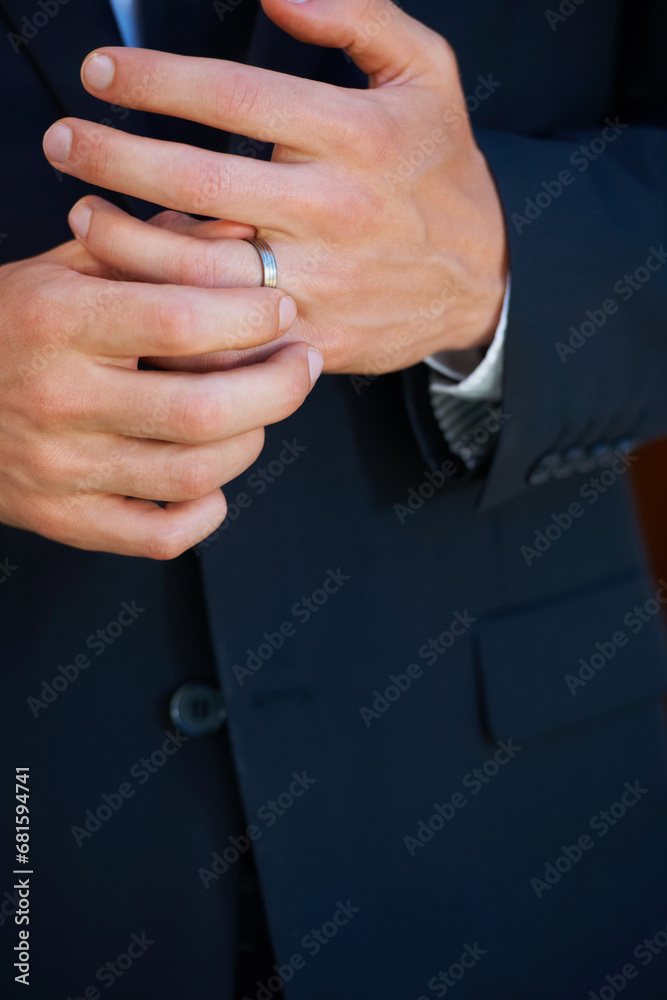 Groom, hand closeup and ring for marriage, ceremony or celebration in suit, fingers and event. Person, palm and metal jewelry for wedding, party or commitment to relationship, engagement or proposal