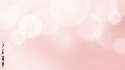 Abstract background with bokeh light effect. Blurred shiny circles on pink backdrop. Elegance banner template for Valentines or Mothers Day