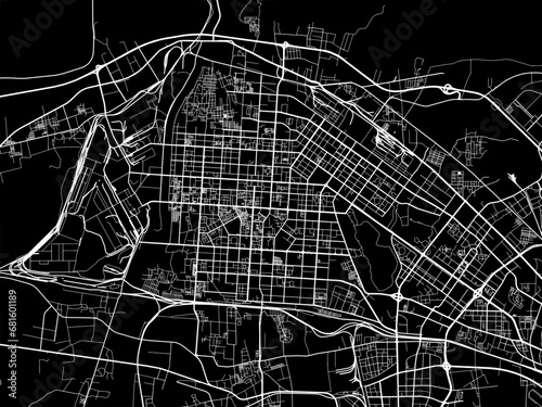 Vector road map of the city of Baotou in People's Republic of China (PRC) with white roads on a black background. photo