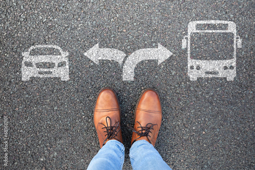 Young man taking a decision between car and public transport.