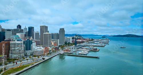 San Francisco city aerial The Embarcadero with boats docked in bay and downtown skyscrapers CA © Nicholas J. Klein