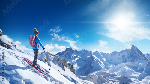 Portrait of a skier girl in helmet and ski goggles on background of snowy Alpine mountains. photo