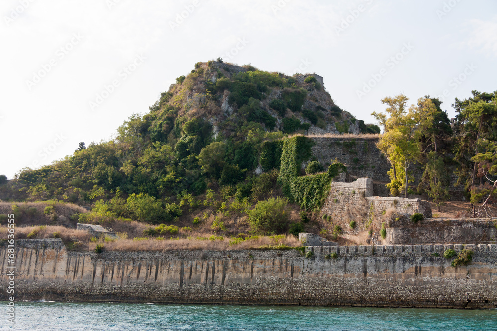Cliffs with ancient walls near the Mediterranean Sea, Corfu
