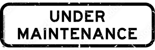 Grunge black under maintenance word square rubber seal stamp on white background