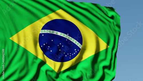 Close-up of the national flag of Brazil flutters in the wind on a sunny day , 4k slow motion photo