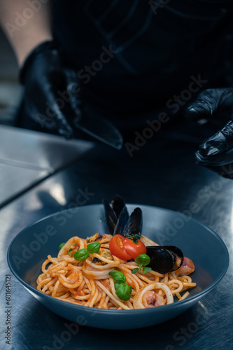 Chef preparing Seafood Past...