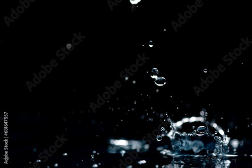 rain. water droplets, splashes on a black background