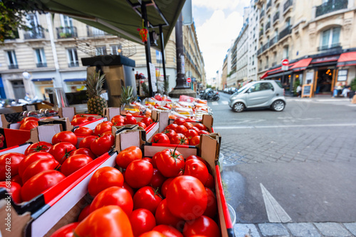 Fototapeta Naklejka Na Ścianę i Meble -  Tomatoes on display at a street market in Paris, France