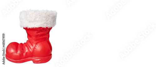 Christmas banner .Santa's red boot with white fur isolate, close-up.Concept for postcard, invitation,gift,holiday,copy space, layout, mock-up, poster,congratulations, promotions, purchases,decoration 