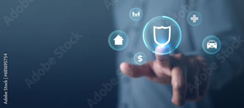 assurance, care, family, finance, health, insurance, investment, life, hospital, protection. touching shield hud with dollar and asset icons, exploring insurance and retire planning for future. photo