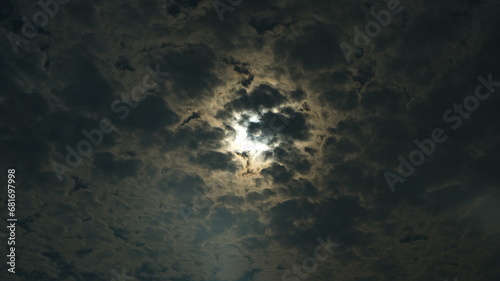 Cloudy sky and moon halo