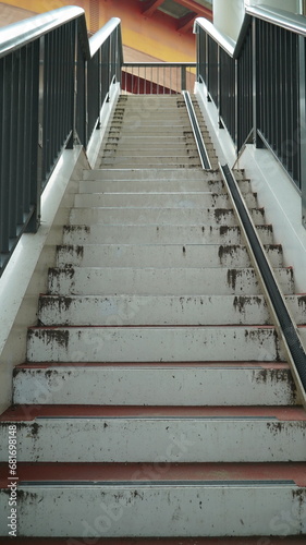 Old staircase structure installed under the bridge