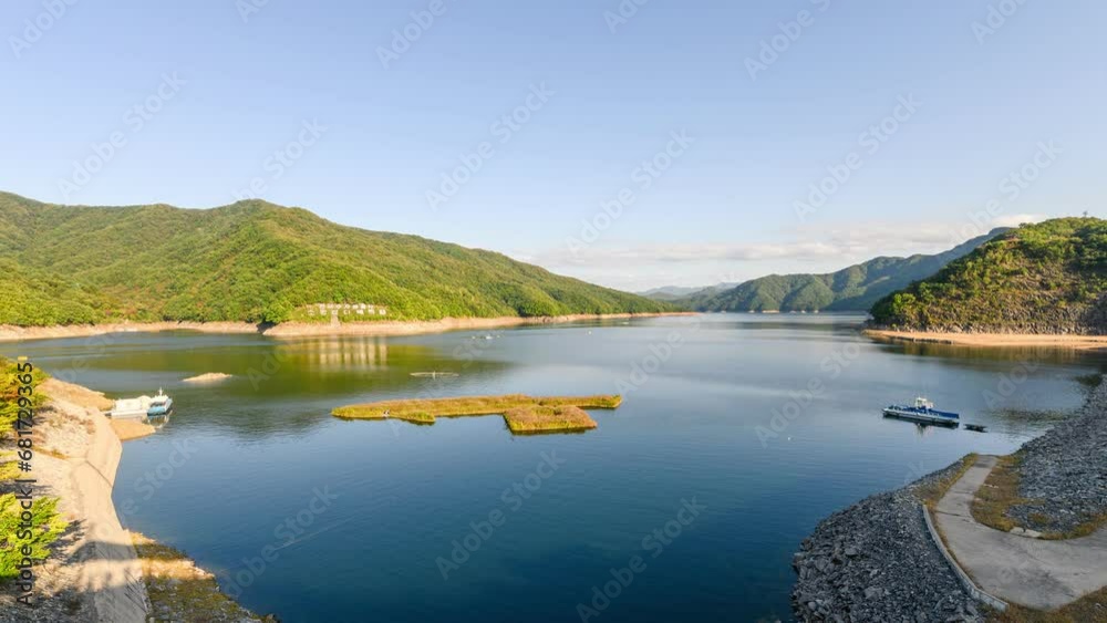 Soyanggang Dam with Soyang river and blue sky in valley on sunny at Chuncheon, Gangwondo, South Korea Soyanggang Dam with Soyang river and blue sky in valley on sunny at Chuncheon, Gangwondo, South Korea
