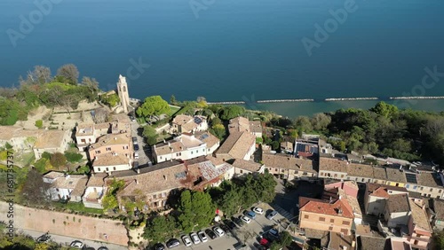 Italy, November 20, 2023 - aerial view of the medieval village of Fiorenzuola di Focara immersed in the San Bartolo park. We are located in the province of Pesaro and Urbino in the Marche region photo