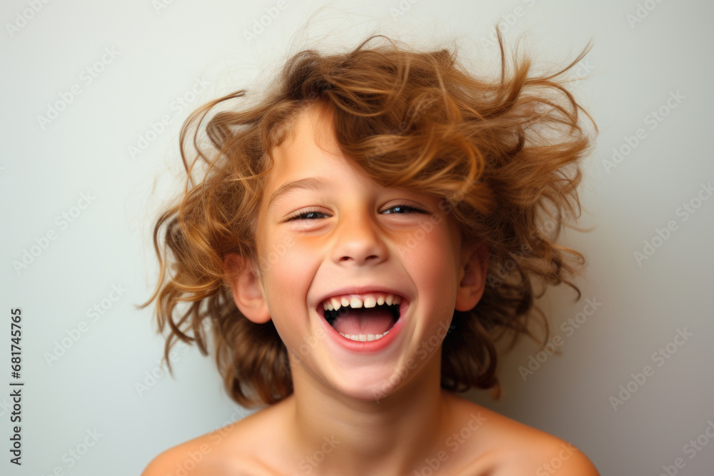 Picture of young girl with big smile on her face. Perfect for capturing joy and happiness in any project Picture of young girl with big smile on her face. Perfect for capturing joy and happiness in any project