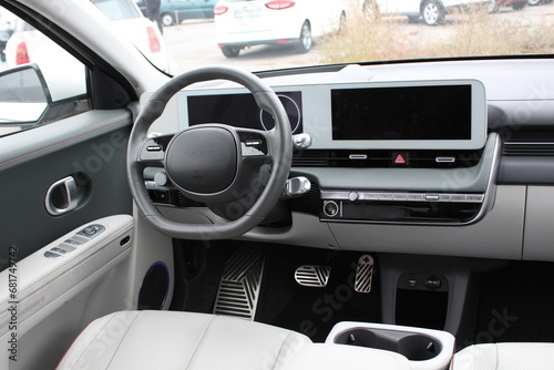 Interior new electric car. Electric car interior details. Electric car dashboard.