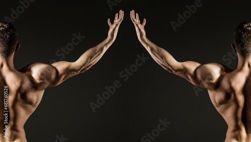 Sexy model. Muscular body. Strong man. Man Power. Perfect Shoulders and Back Muscles. Muscular Man showing Strength, Back view. Sexy body. Strong Power Shoulders. Banner.