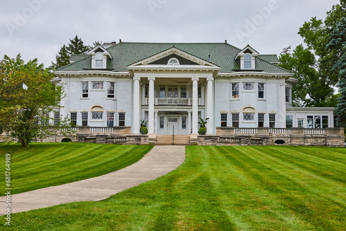 Large white estate house with green lawn and small vegetable garden, Muncie, IN © Nicholas J. Klein