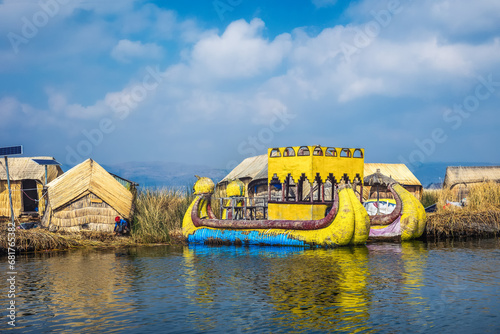 Reed boat on the floating islands of Uros in Lake Titicaca. Peru photo
