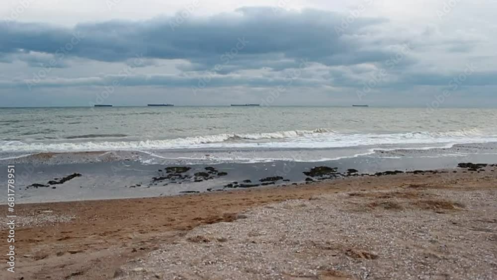 The guy does acrobatic stunts on the background of the sea
The guy does acrobatic stunts on the background of the sea