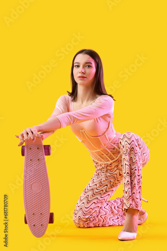 Stylish young woman with sk...