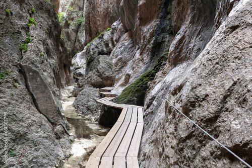 Wooden path at The Parrizal spot in Beceite, Teruel province, Spain photo