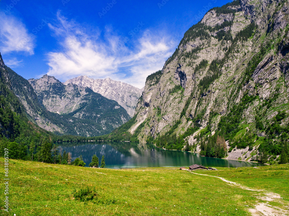 Landscape lake and mountain view with footpath in the front