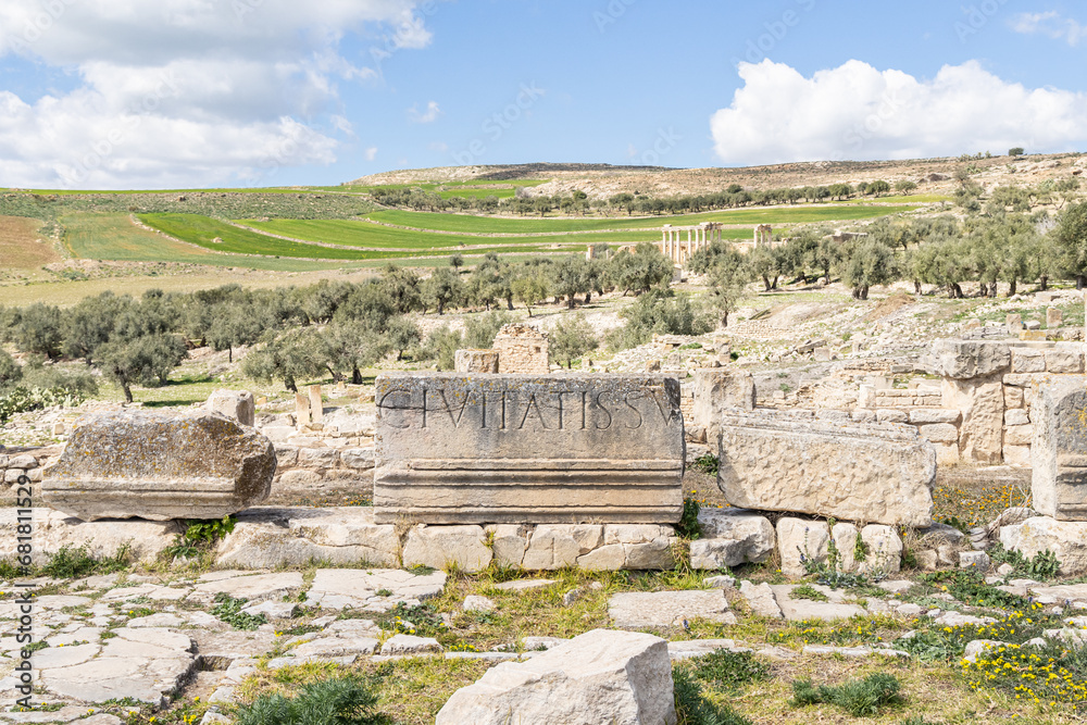 Stone at the Roman ruins of Dougga,  inscribed with the Latin word civitatissum, meaning citizenship.