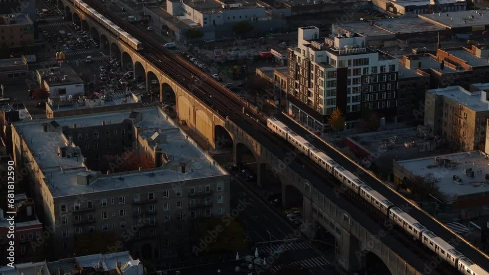 Aerial shot of the subway passing through Queens, New York. Shot during the Autumn of 2023 in 4k. Aerial shot of the subway passing through Queens, New York. Shot during the Autumn of 2023 in 4k.