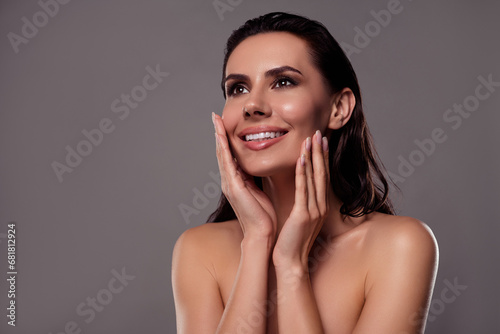 Photo portrait of pretty young girl touch cheeks soft silky skin spa salon isolated on dark gray color background