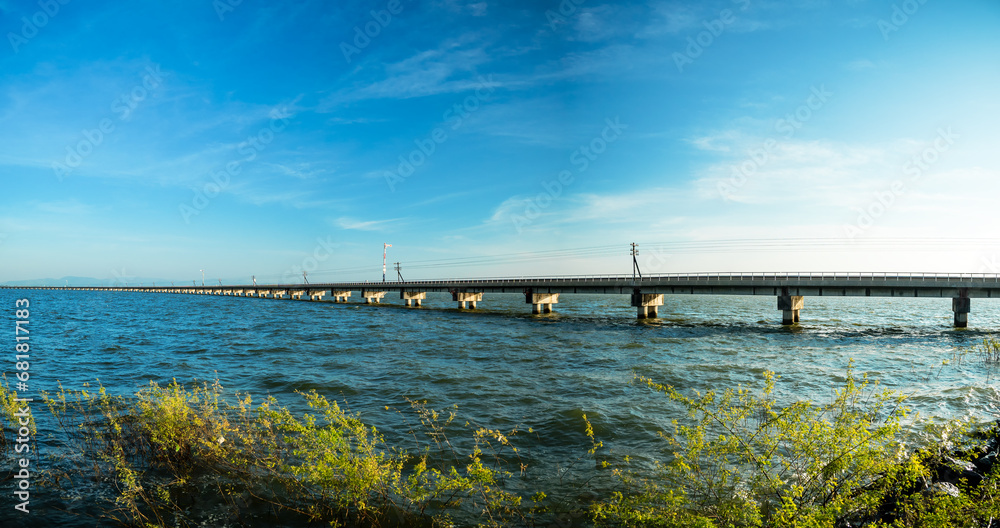 Wall Mural Floating train on Pasak Jolasid dam at Khok Salung Train Station in Khok Salung,