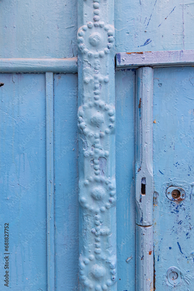 Blue painted wooden door on a house near the Tunis souk. Blue painted wooden door on a house near the Tunis souk.