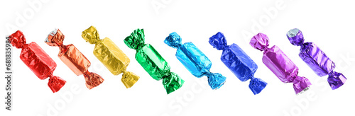 Tasty candies in bright wrappers isolated on white, set photo