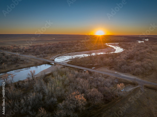 sunset over prairie and the South Platte River in eastern Colorado near Crook, aerial view of late November scenery
